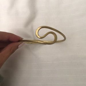 Gold free people arm band